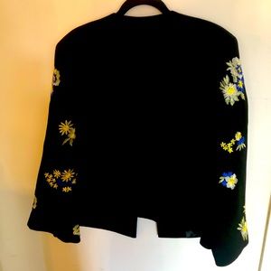 Tahari Black Jacket w/flared sleeve and floral embroidery. Excellent condition.